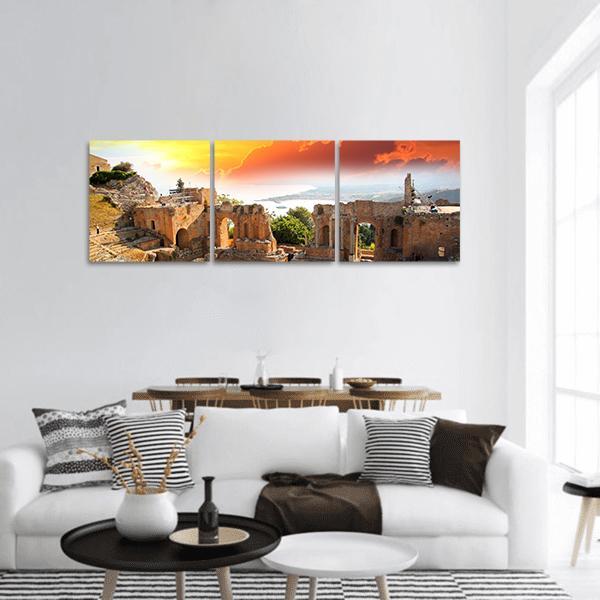 Taormina Theater at Sunset Panoramic Canvas Wall Art in brown, orange and yellow, hung on a wall