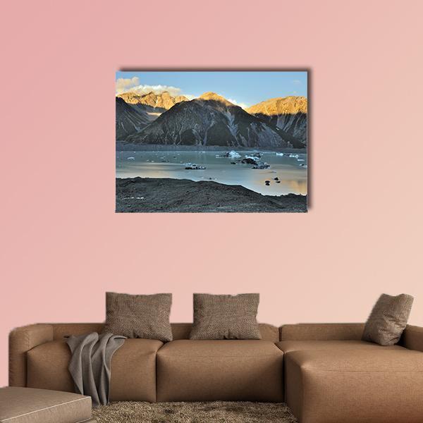 Tasman Glacier and Lake Canvas Wall Art in gray, gold and blue, single panel hung on a wall