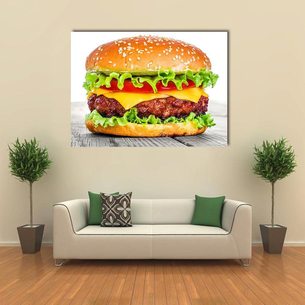 Tasty Hamburger with Sesame Seed Bun Canvas Wall Art in white, brown and yellow, single panel hung on a wall