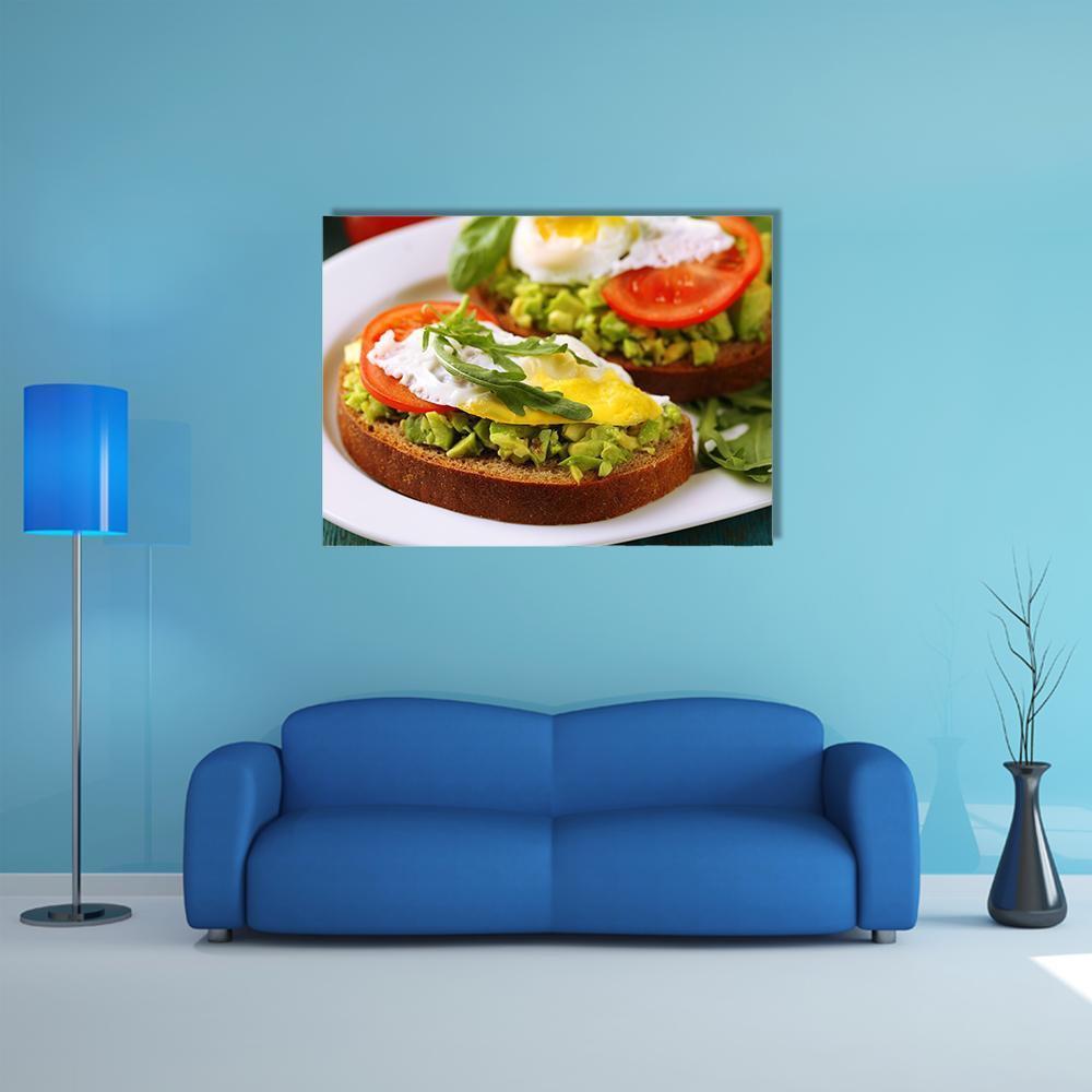 Avocado Toast with Sunny-side Egg Canvas Wall Art in white, brown and green, single panel hung on a wall