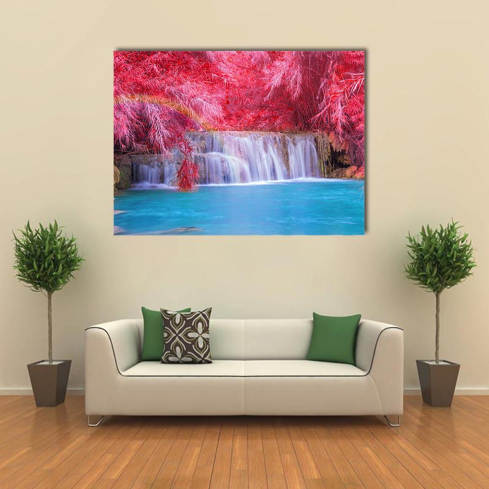 Tat Kuang Si Waterfalls, Luang Prabang Canvas Wall Art in red, blue and pink, single panel hung on a wall