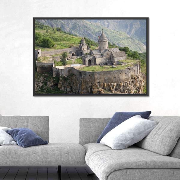 Tatev Monastery on Steep Cliffs Canvas Wall Art in gray, brown and green, framed canvas, product view on a white background