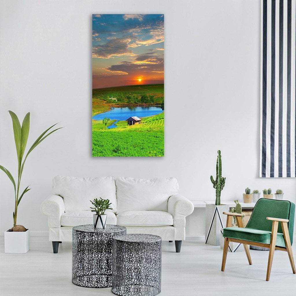 Tea Plantation Fields in Vietnam Vertical Canvas Wall Art in orange, green and blue, single vertical panel hung on a wall