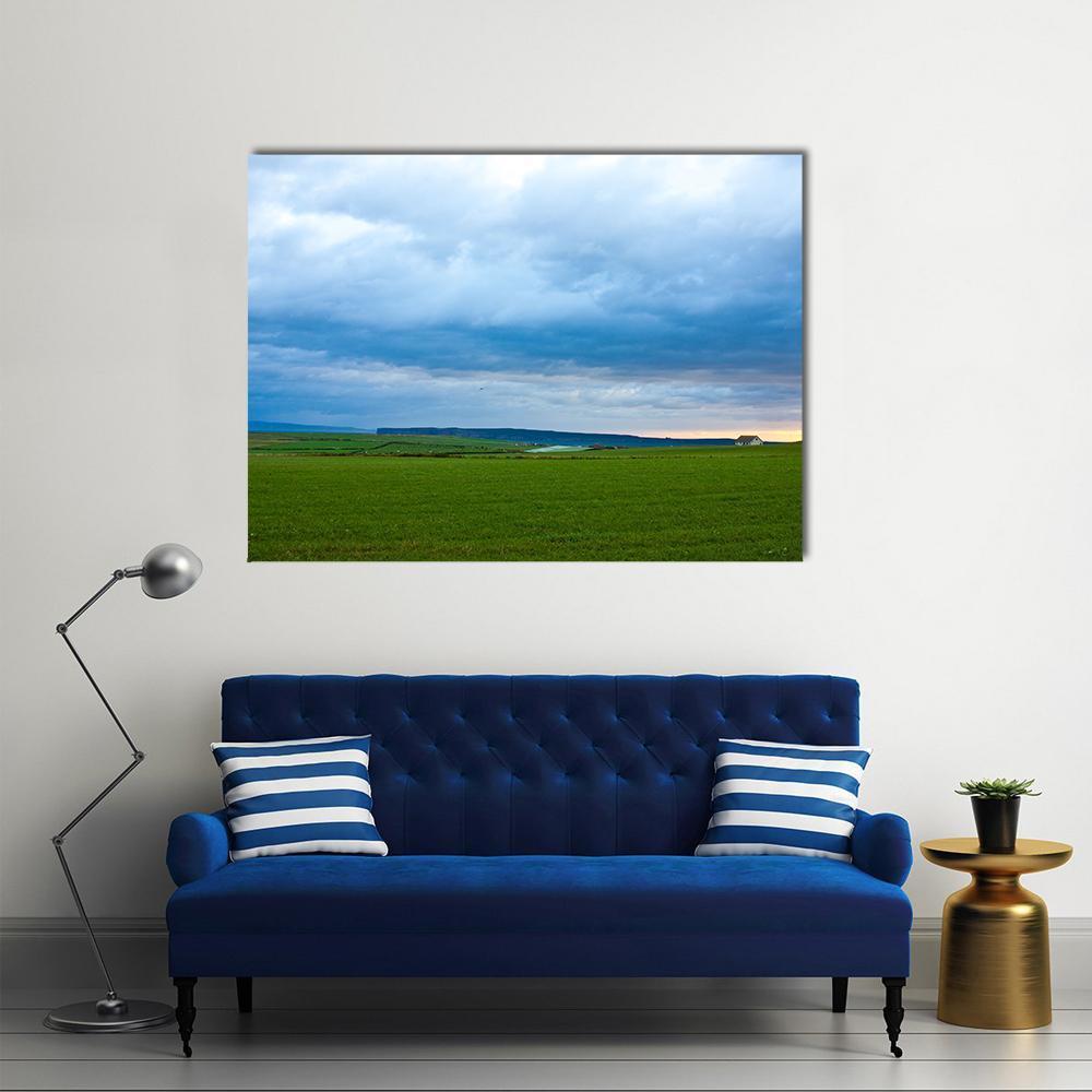Tempest in Scotland Canvas Wall Art in white, green and blue, single panel hung on a wall