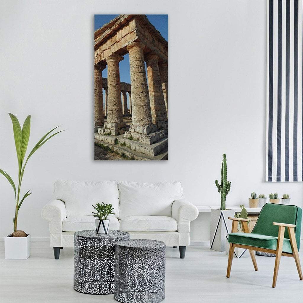 Ancient Greek Temple with Doric Columns Vertical Canvas Wall Art in beige, brown and blue, single vertical panel hung on a wall