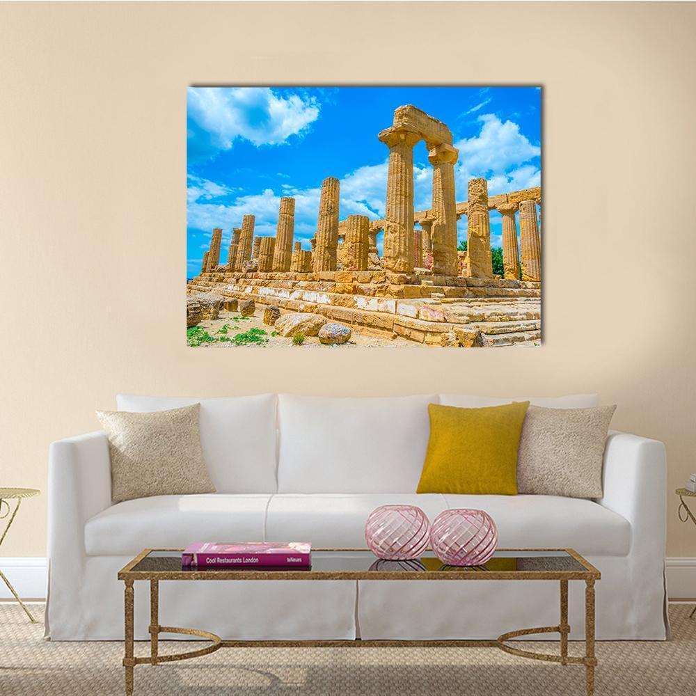 Temple of Juno in Italy Canvas Wall Art in beige, brown and blue, single panel hung on a wall