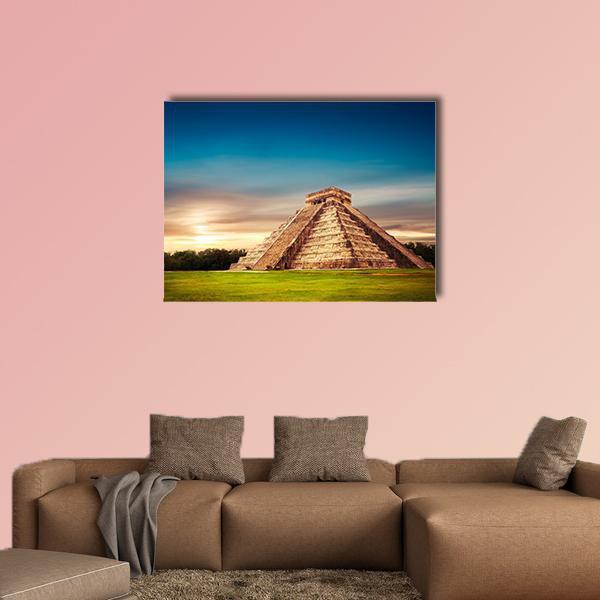 Temple of Kukulkan at Sunset Canvas Wall Art in brown, orange and blue, single panel hung on a wall
