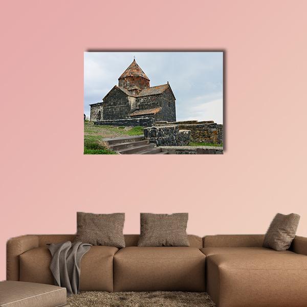 Sevanavank Monastery Stone Church Canvas Wall Art in gray, brown and blue, single panel hung on a wall
