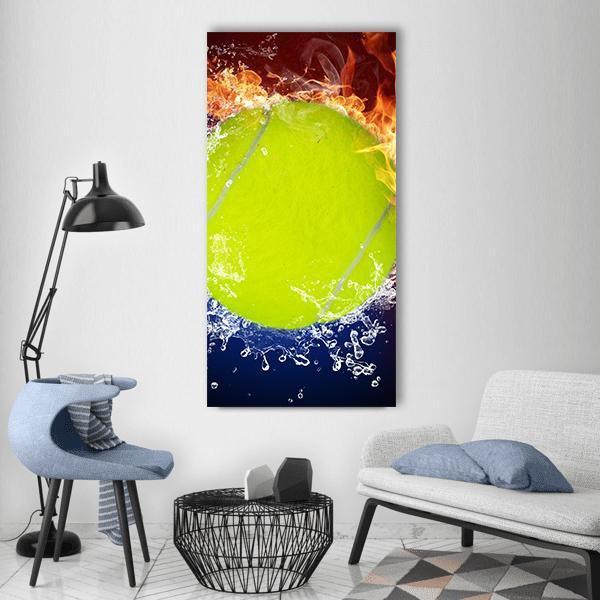 Tennis Ball Split Between Fire and Water Vertical Canvas Wall Art in orange, yellow and blue, single vertical panel hung on a wall
