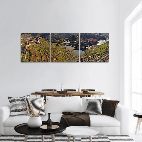 Terraced Rice Fields in Sapa, Vietnam Panoramic Canvas Wall Art in brown and green, hung on a wall