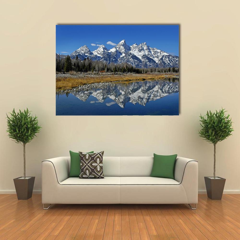 Teton Mountain Range Canvas Wall Art in white, brown and blue, single panel hung on a wall