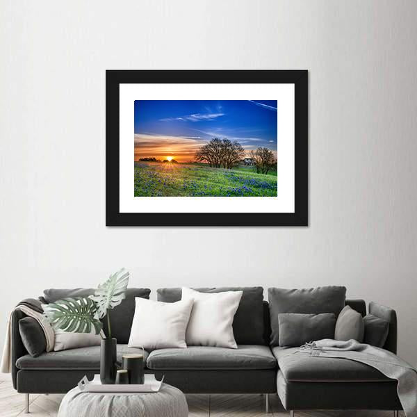 Texas Bluebonnet Field at Sunset Canvas Wall Art in orange, green and blue, 3 panel horizontal set hung on a wall