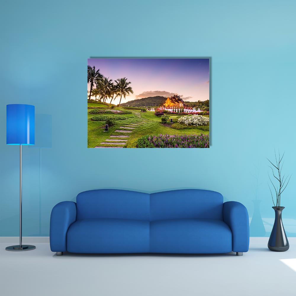 Royal Flora Ratchaphruek Park at Dusk Canvas Wall Art in yellow, green and purple, single panel hung on a wall