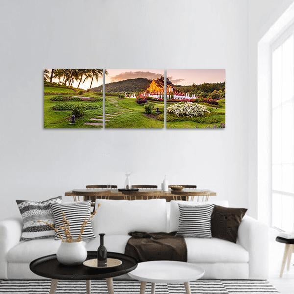 Royal Flora Ratchaphruek Park Sunset Garden Panoramic Canvas Wall Art in orange, yellow and green, hung on a wall
