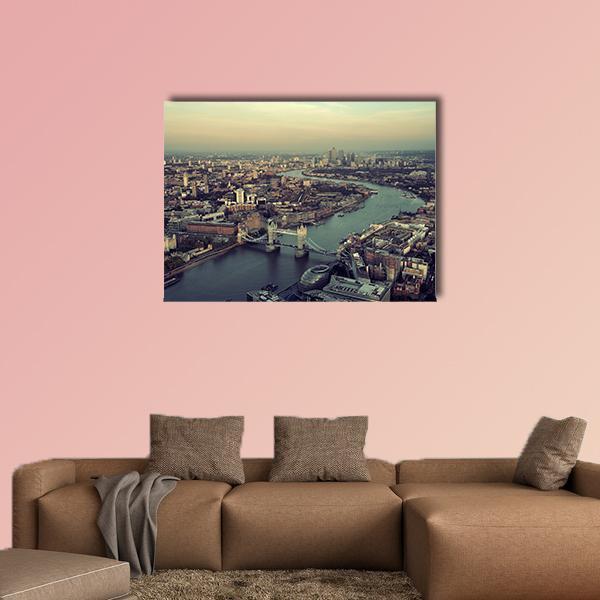 Aerial View of the Thames Canvas Wall Art in gray, brown and blue, single panel hung on a wall