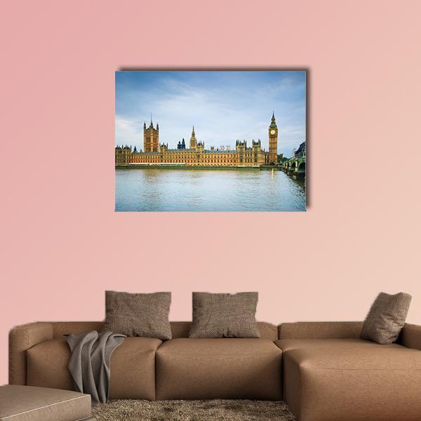 Palace of Westminster and Thames River Canvas Wall Art in brown, gold and blue, single panel hung on a wall