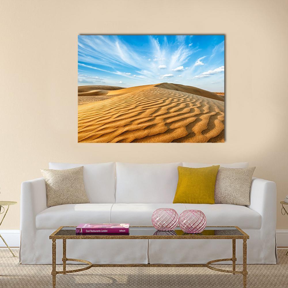 Thar Desert Sand Dunes Canvas Wall Art in orange, yellow and blue, single panel hung on a wall