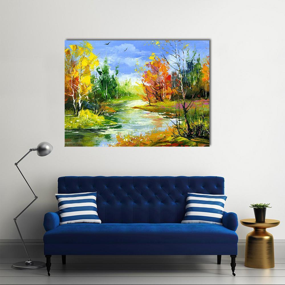 Autumn River Landscape Canvas Wall Art in yellow, green and blue, single panel hung on a wall