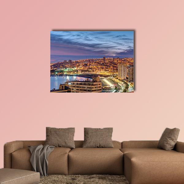 Bay of Valparaiso at Dusk Canvas Wall Art in orange, blue and purple, single panel hung on a wall