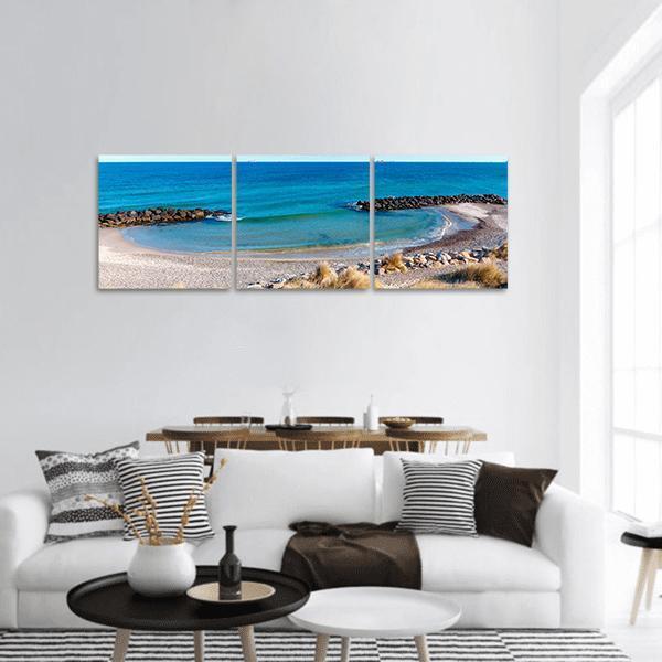 Beach at Skagen Panoramic Canvas Wall Art in beige, brown and blue, hung on a wall