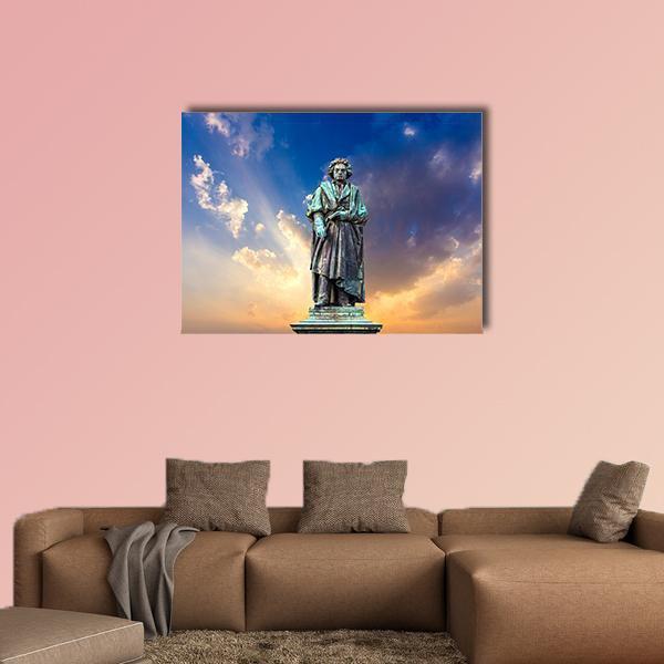 Beethoven Monument at Sunset Canvas Wall Art in orange, yellow and blue, single panel hung on a wall