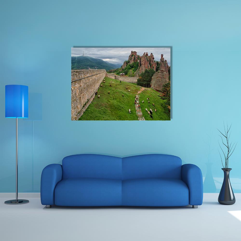 Belogradchik Rock Formations with Sheep Canvas Wall Art in gray, brown and green, single panel hung on a wall