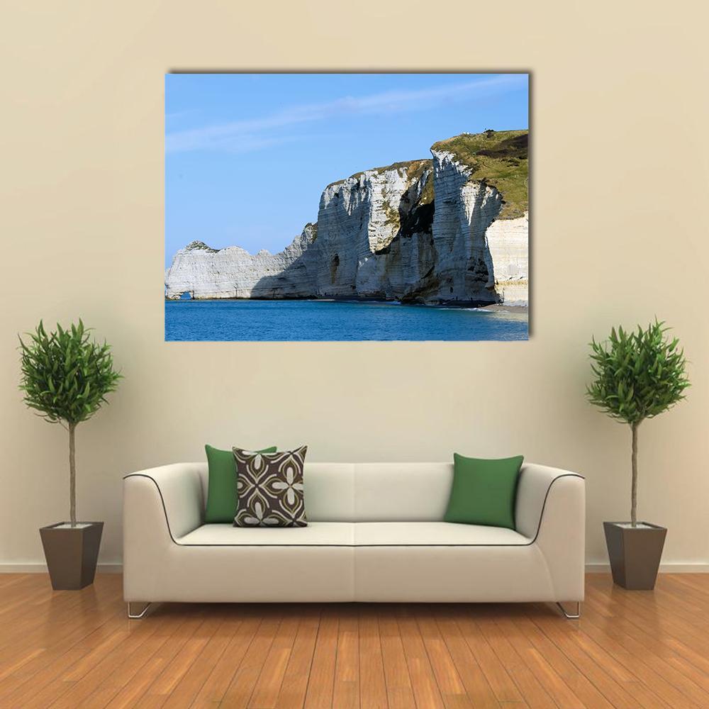 Cliffs of Etretat Canvas Wall Art in white, beige and blue, single panel hung on a wall