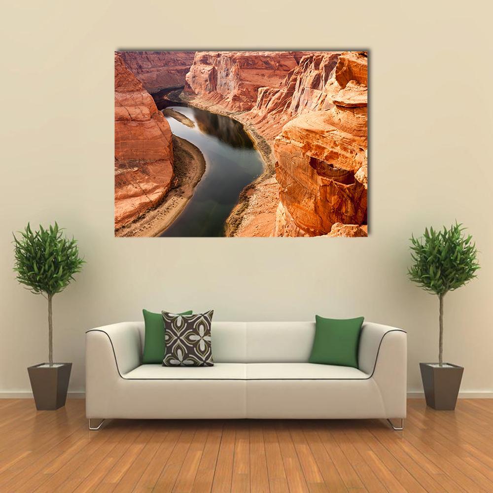 Colorado River Meanders Canvas Wall Art in black, brown and orange, single panel hung on a wall