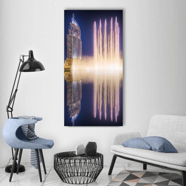 Burj Khalifa Dancing Fountains Vertical Canvas Wall Art in gold, blue and purple, single vertical panel hung on a wall