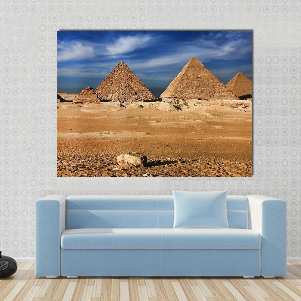 Pyramids of Giza Canvas Wall Art in beige, brown and blue, single panel hung on a wall