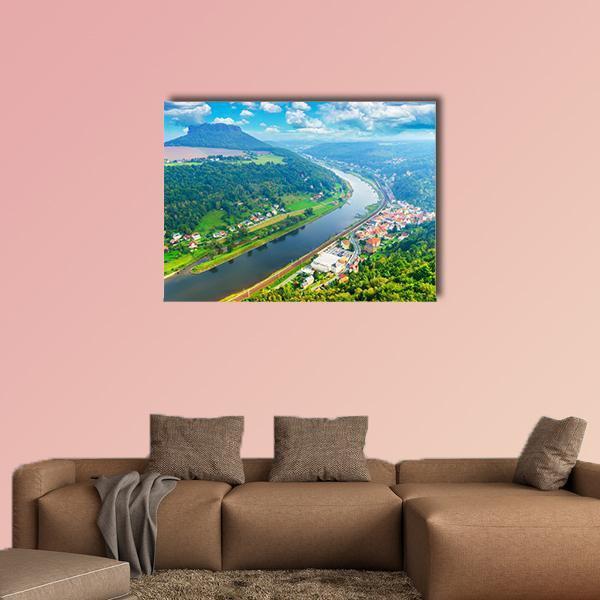 The Elbe River Canvas Wall Art in green and blue, single panel hung on a wall