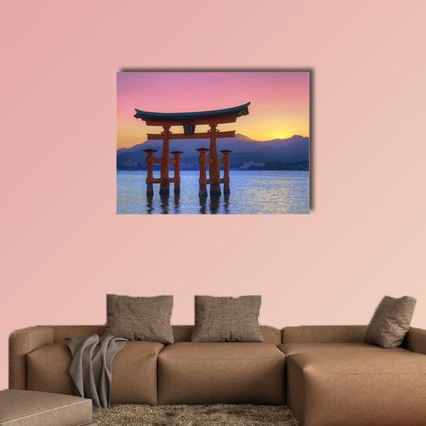 Floating Torii Gate Canvas Wall Art in orange, blue and pink, single panel hung on a wall