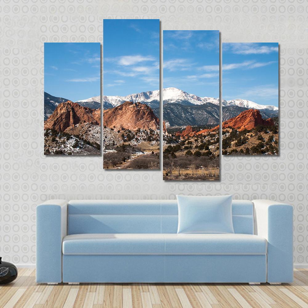 Garden of the Gods Park Colorado Canvas Wall Art in brown, red and blue, 4 panel Pop layout hung on a wall