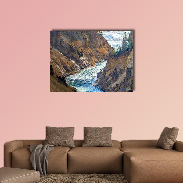 Grand Canyon of the Yellowstone Canvas Wall Art in beige, brown and blue, single panel hung on a wall