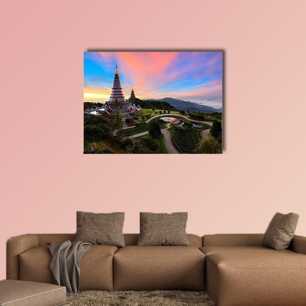 Sunset Pagoda in Thailand Canvas Wall Art in orange, blue and pink, single panel hung on a wall