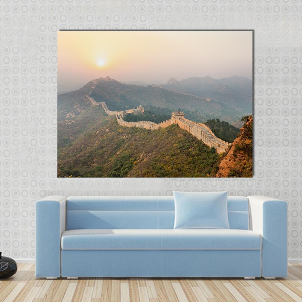 Great Winding Through Mountains at Sunrise Canvas Wall Art in beige, orange and yellow, single panel hung on a wall