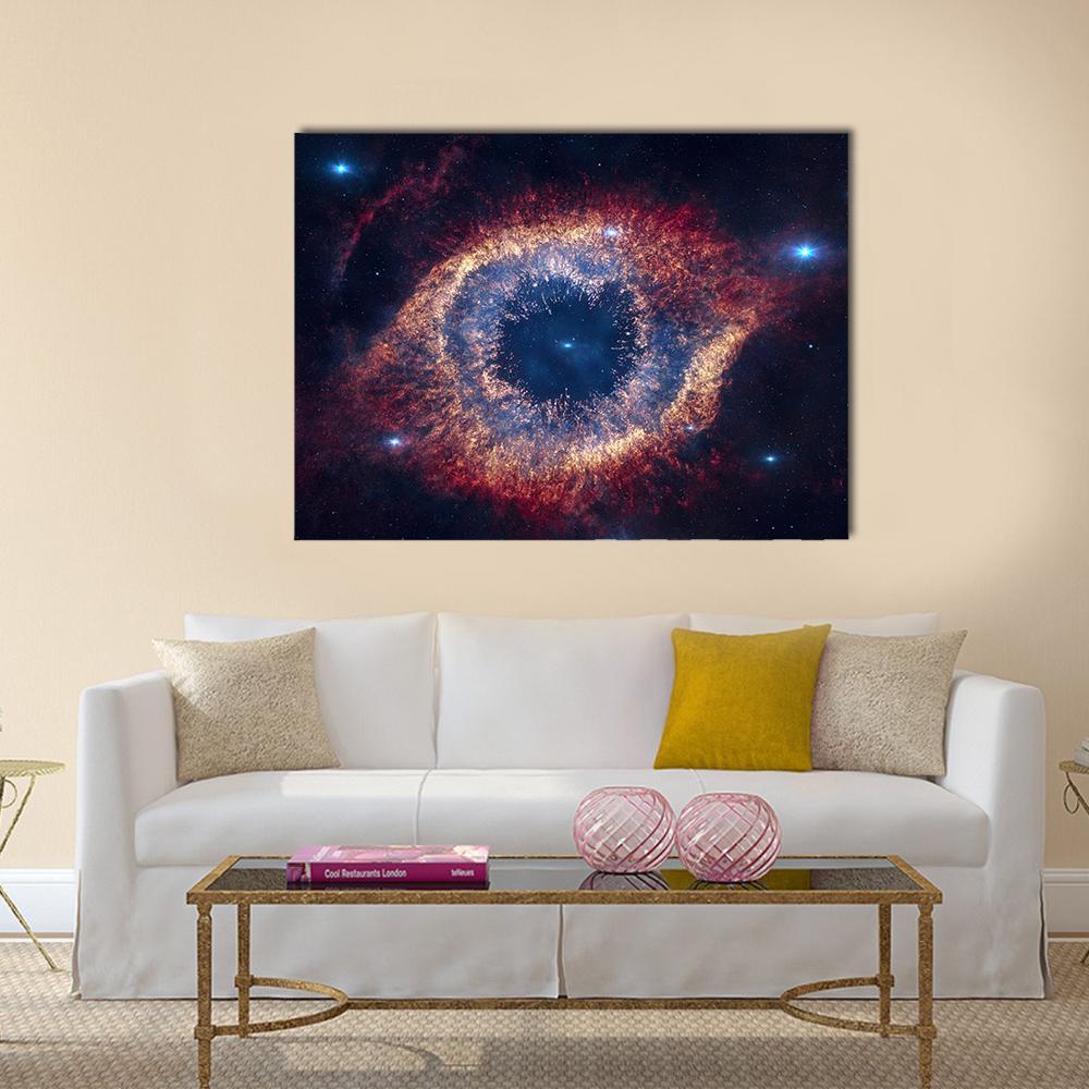 Helix Nebula (eye of God) Canvas Wall Art in black, orange and blue, single panel hung on a wall