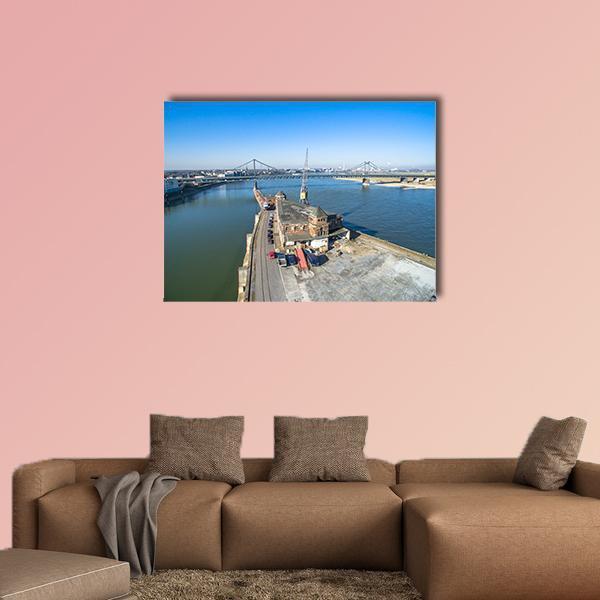 Historic Krefeld Harbor Canvas Wall Art in gray, brown and blue, single panel hung on a wall