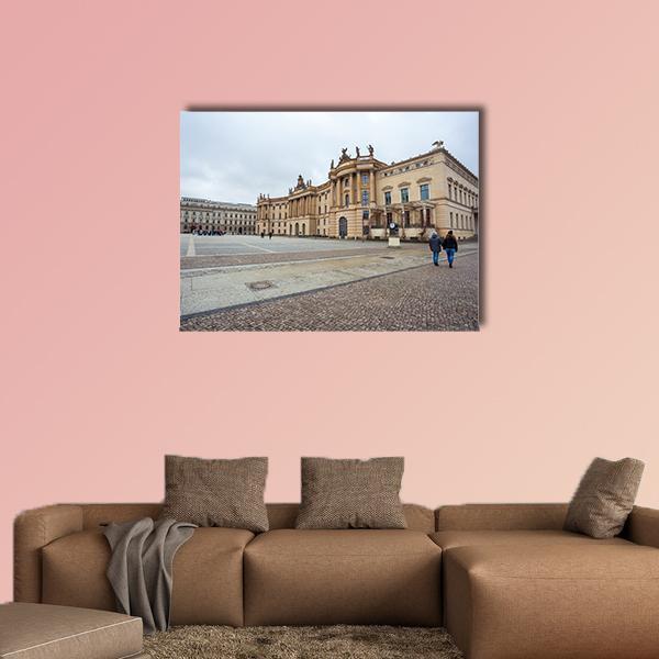 Humboldt University Facade on Cobblestone Square Canvas Wall Art in gray, beige and brown, single panel hung on a wall