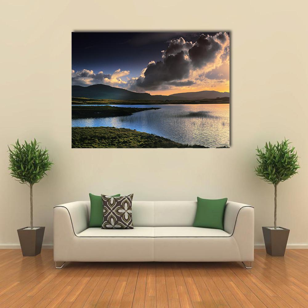 Isle of Skye Sunset Reflections Canvas Wall Art in black, orange and blue, single panel hung on a wall