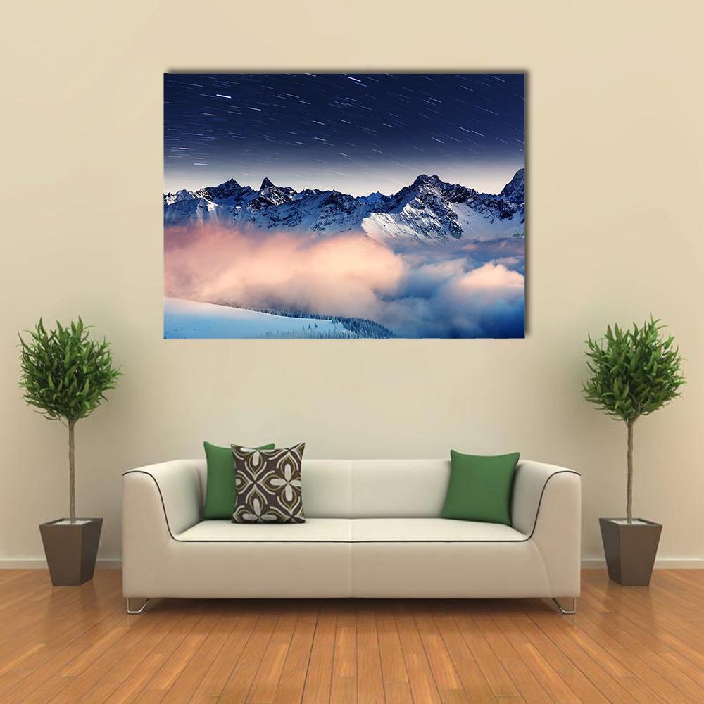 Milky Way Over Winter Mountains Canvas Wall Art in white, blue and navy, single panel hung on a wall