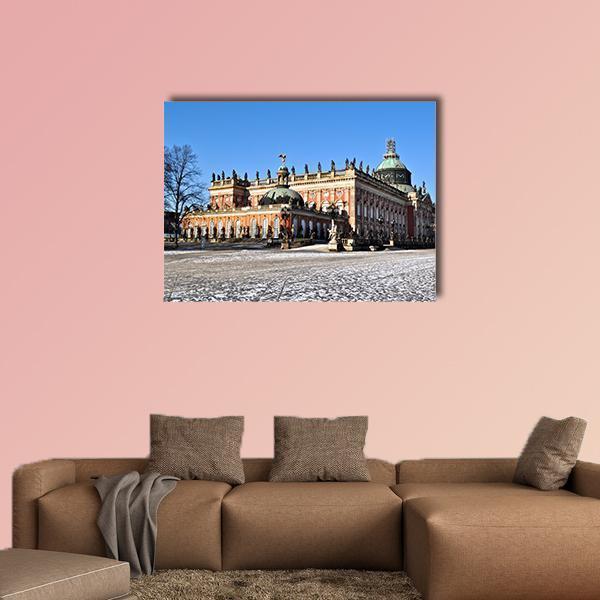 Neues Palais Winter Facade Canvas Wall Art in white, brown and blue, single panel hung on a wall