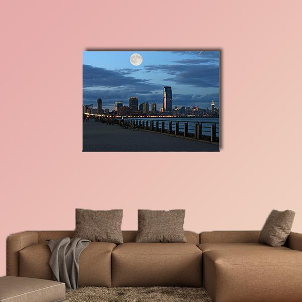 New York Skyline at Twilight Canvas Wall Art in black, gray and blue, single panel hung on a wall