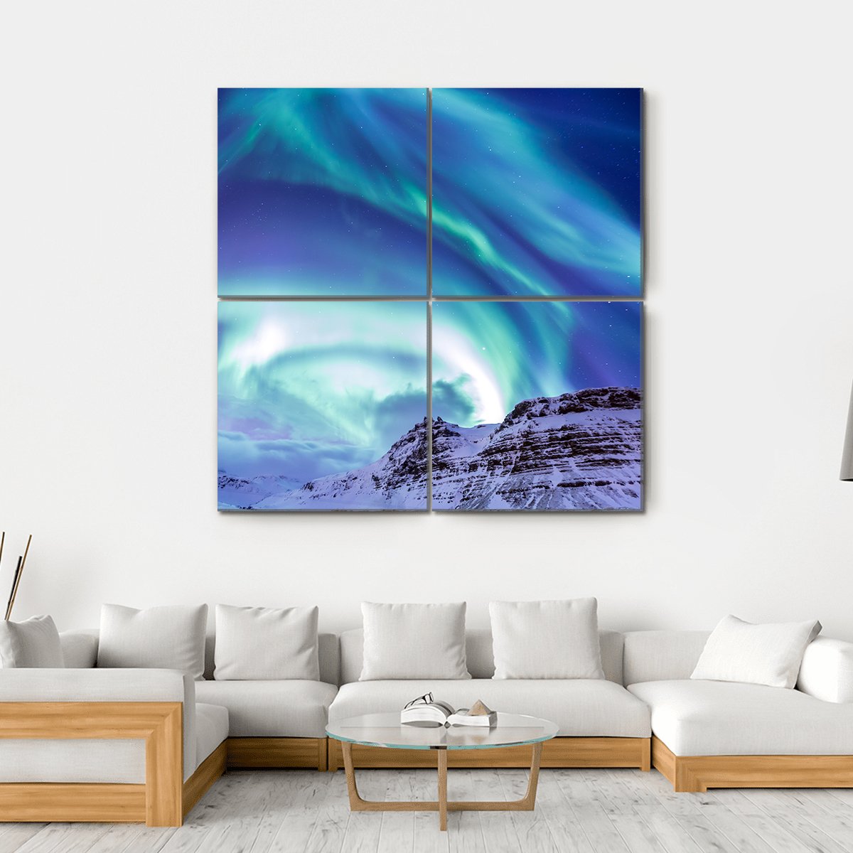 Aurora Over Kirkjufell Canvas Wall Art in green, blue and purple, hung on a wall