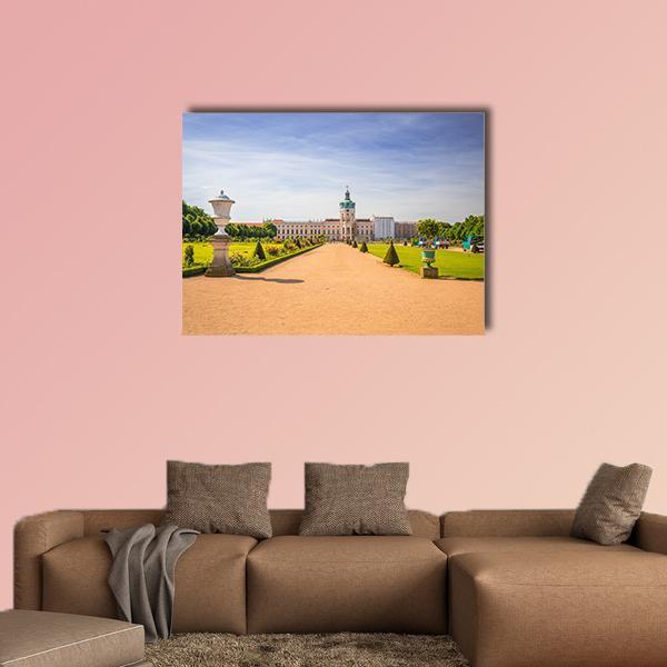 Garden of Charlottenburg Canvas Wall Art in beige, green and blue, single panel hung on a wall