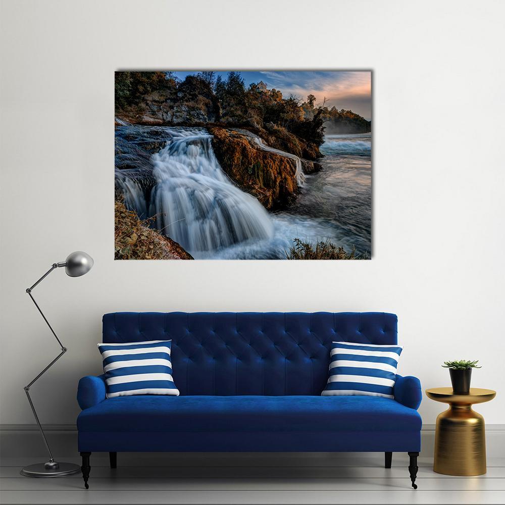 Rhine Falls Waterfall at Sunset Canvas Wall Art in brown, orange and blue, single panel hung on a wall