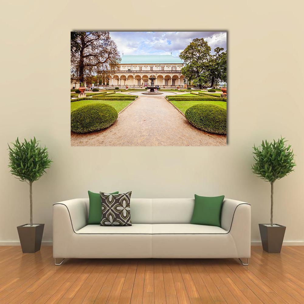 Palace of Queen Anne Garden, Czechia Canvas Wall Art in beige, green and blue, single panel hung on a wall
