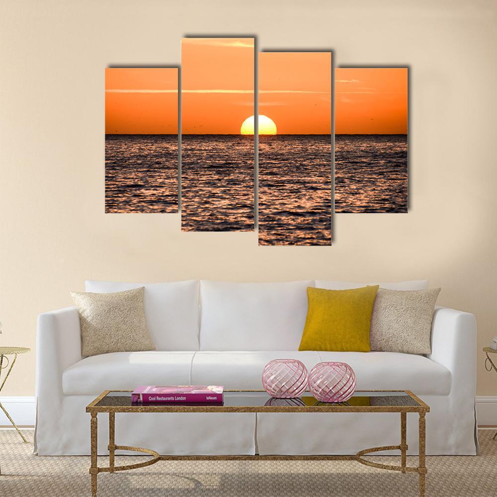 The Sun Setting In Sea Canvas Wall Art-4 Pop-Gallery Wrap-50" x 32"-Tiaracle