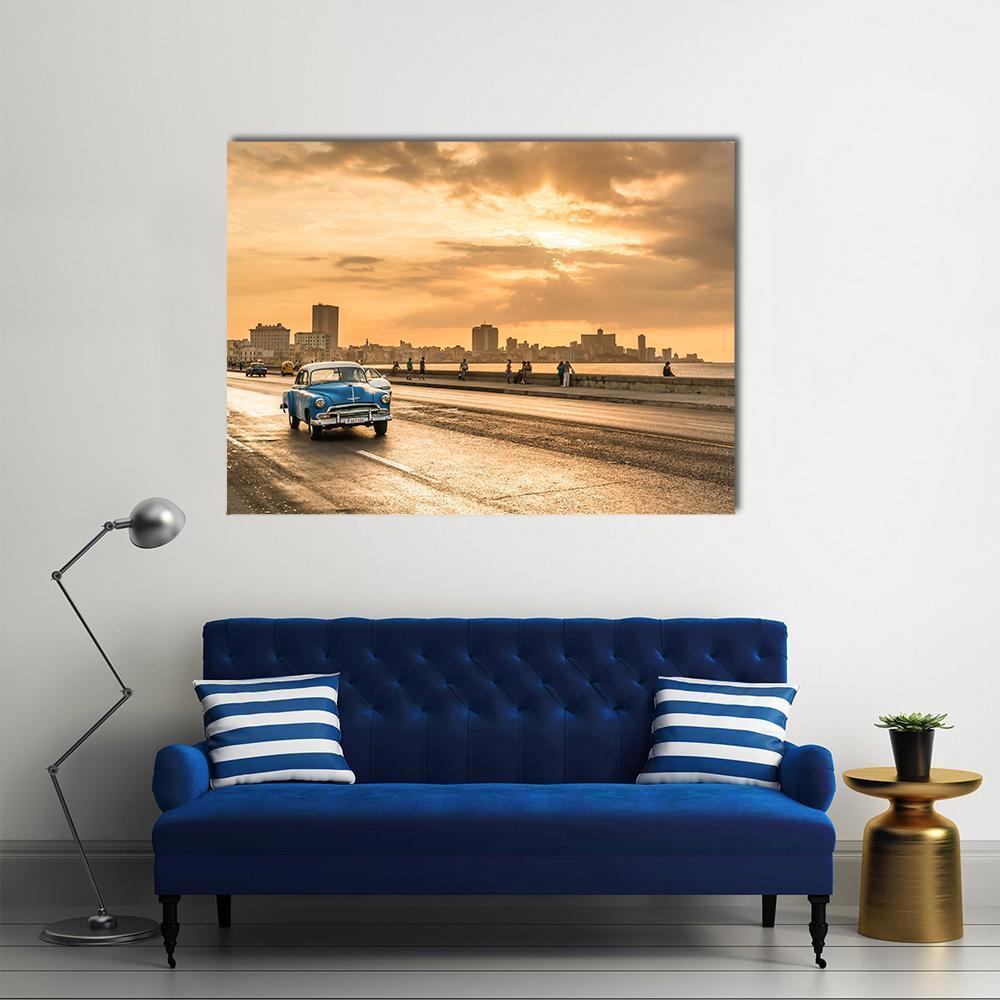 Vintage Blue Car at Sunset in Havana Canvas Wall Art in orange, yellow and blue, single panel hung on a wall