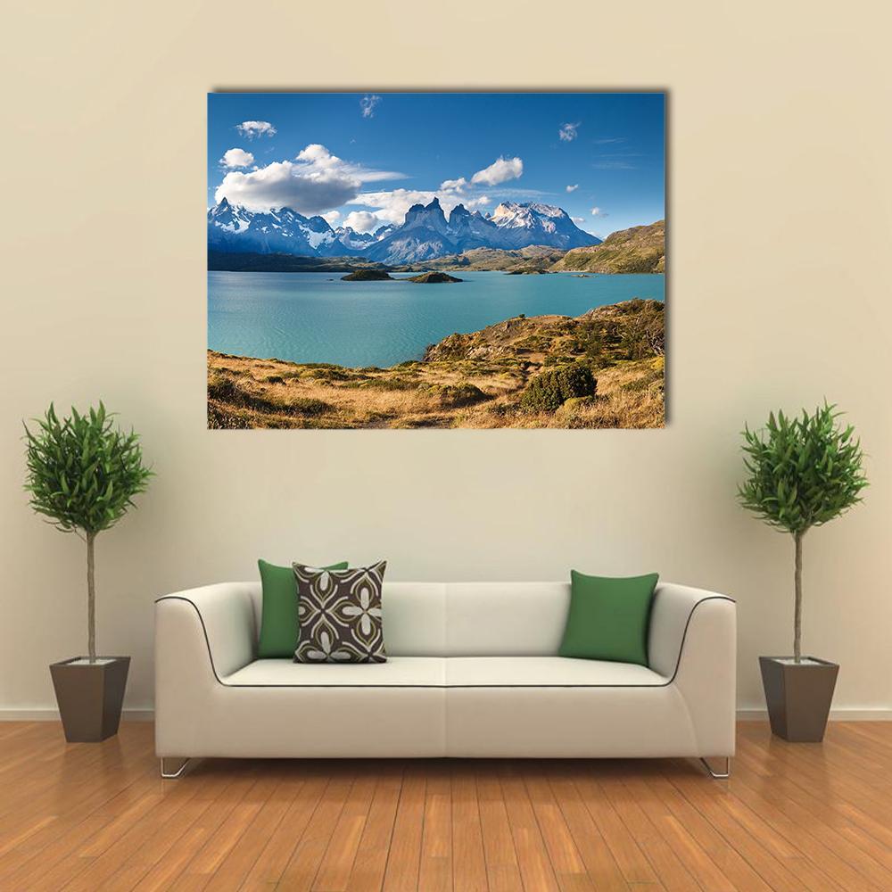 Torres Del Paine Lake and Peaks Canvas Wall Art in white, brown and blue, single panel hung on a wall